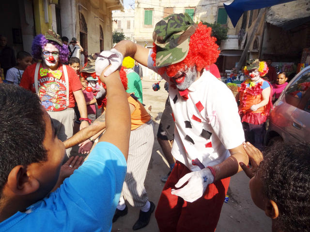 Egyptian Rebel Clown practice on the streets in the neighbourhood Kom ElDeka in Alexandria - November 2012 - Photo: Hans and Maro