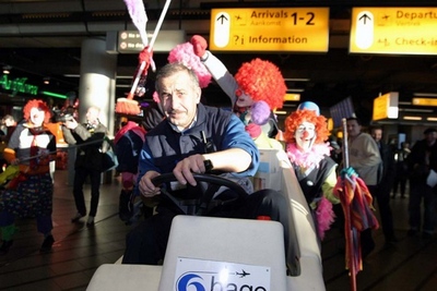 Sunday, December 16th 2007: clown cleaners support actions of the cleaners at Amsterdam Airport Schiphol for respect, decent wages, job security and better working conditions. Photo: Nico Jankowski